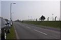 SJ4382 : The boundary fence at Liverpool Airport by Ian Greig