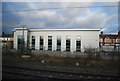 Building by the West Coast Main Line