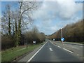 Footpath sign by the A39