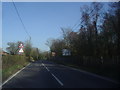 The B2027 approaching the railway bridge