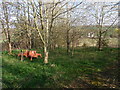 The Flyford Arms through the trees