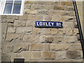 White on blue enamel street nameplate