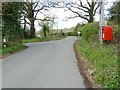 Sharp bend on the road to Milland