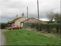 NZ1318 : Toll Gate Cottage next to the B6274 by peter robinson