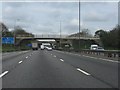 SP7455 : M1 motorway - southernmost footbridge near Collingtree by Peter Whatley