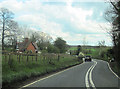 Sharp bend on A495 approaching Newton Cottages