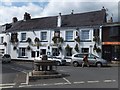 Drinking trough and Cromwell Arms Inn