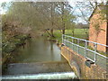 Weir on the Sor Brook at Lower Grove Mill