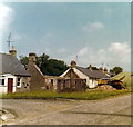 A cottage beside the Mercat Cross, Kinrossie, being re-thatched