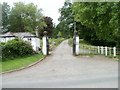 Lodge and entrance gates to Castle Farm, Llangybi