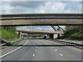SJ5579 : Farm bridge & rail bridge over the M56 by Ian S