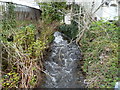 A stream flows towards The Square, Abertridwr