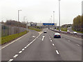 NS6466 : M8 Motorway at Junction 11 by David Dixon