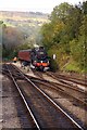 Steam train approaching the station