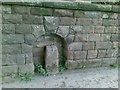 Boundary stone next to The Bridestones