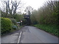 Bryn Road railway arch and village boundary sign