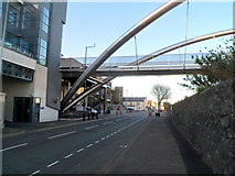 SH2482 : Victoria Road passes under the Celtic Gateway footbridge, Holyhead by Jaggery