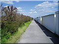 Path adjacent to beach huts