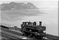 Elderly ex-GWR Pannier 0-6-0T by Severn Estuary near Awre Junction