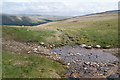 SD9370 : Small beck which runs down to Arncliffe Cote by Bill Boaden