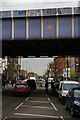 Bethnal Green Road, E2, seen from the crossroads at the tube station