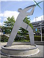 TQ1986 : Modernistic sculpture of a field athlete by Stanley Howe