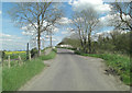 Un-named lane approaches Patney Bridge