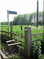 Stile and waymarker in Little Linford Lane