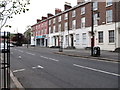 A terrace of shops and offices in Donegall Pass