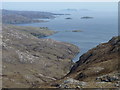 NB2201 : The coastline near Reinigeadal showing the path from Tarbert by Mike Dunn
