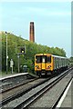 Merseyrail Class 507 EMU departs from Moreton