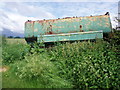 Old Tanker Used to Block Entrance to Field