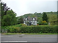 Small cottage beside the A483 road near Fron