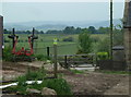 Path through the farmyard at Holestone