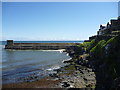 NU2519 : Coastal Northumberland : The South Breakwater, Craster Harbour by Richard West