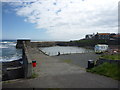 NU2520 : Coastal Northumberland : View Along The North Breakwater at Craster Harbour by Richard West