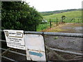 Gate on Limekiln Lane onto guarded property