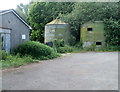 Storage tanks at the northern edge of the former Coleg Gwent Pig Unit, Rhadyr