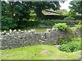 Stone stile into former baptismal pool, Corntown