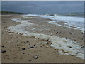 TG4129 : Sea foam and surf on the Norfolk coast by Richard Humphrey
