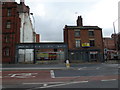 Looking across Gibraltar Street towards a fire engine