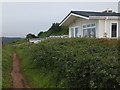 South West Coast Path passing holiday homes at Goodrington