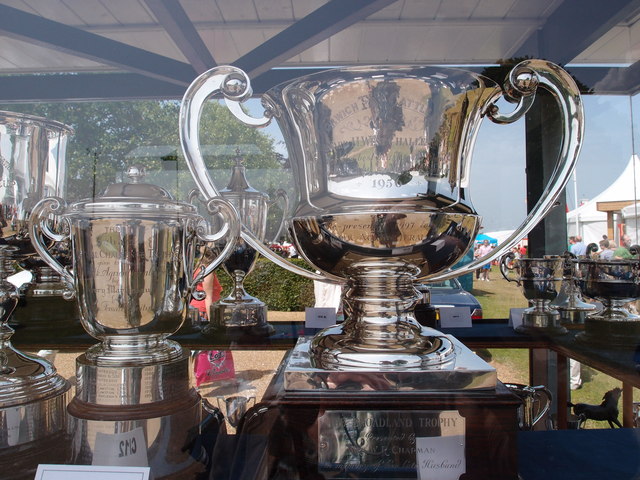 A selection of trophies in the trophy room A selection of the trophies and cups that are awarded by the Royal Norfolk Agricultural Association at the annual show &lt;a href=&quot;https://www.geograph.org.uk/photo/3016414&quot;&gt;TG1410 : Trophy cabinet&lt;/a&gt;.
A Norfolk show has been held since 1847, it gained its Royal prefix in 1908. From 1953 until 1962 the show moved round the county being held on suitable parkland sites. The present site at Costessey covers 375 acres. New exhibition hall and reception areas are the latest additions to the multipurpose site. Average attendance for the two-day show hovers around the 100,000 mark.