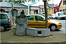 R3377 : Ennis - Barrack Place - Statue of Woman on Bench by Joseph Mischyshyn