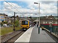 SK0394 : Train for Manchester at Glossop by Gerald England