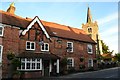 The White Hart public house and church, Chobham