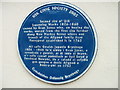 Blue plaque recording site of a Usk Japanning Works