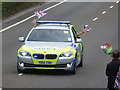 SZ0894 : Ensbury Park: a flag-waving police car by Chris Downer