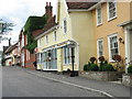 The B1115 road past Bank House Stores, Bildeston