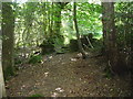 Path through an old stone wall corner